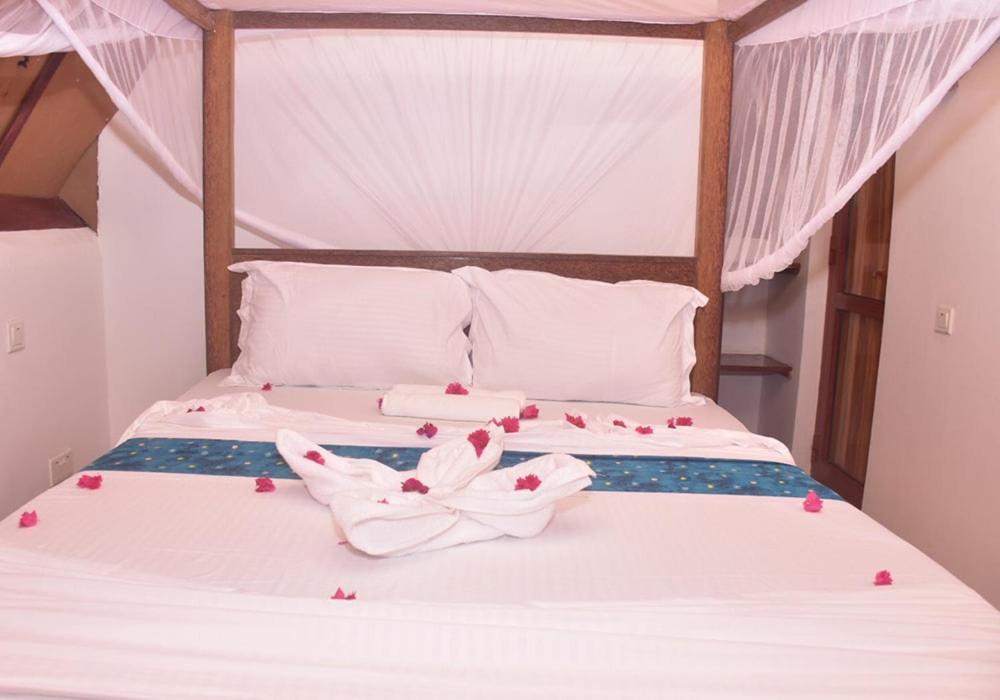 Utulivu Bungalow นูงวี ภายนอก รูปภาพ