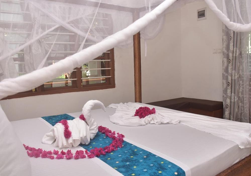 Utulivu Bungalow นูงวี ภายนอก รูปภาพ