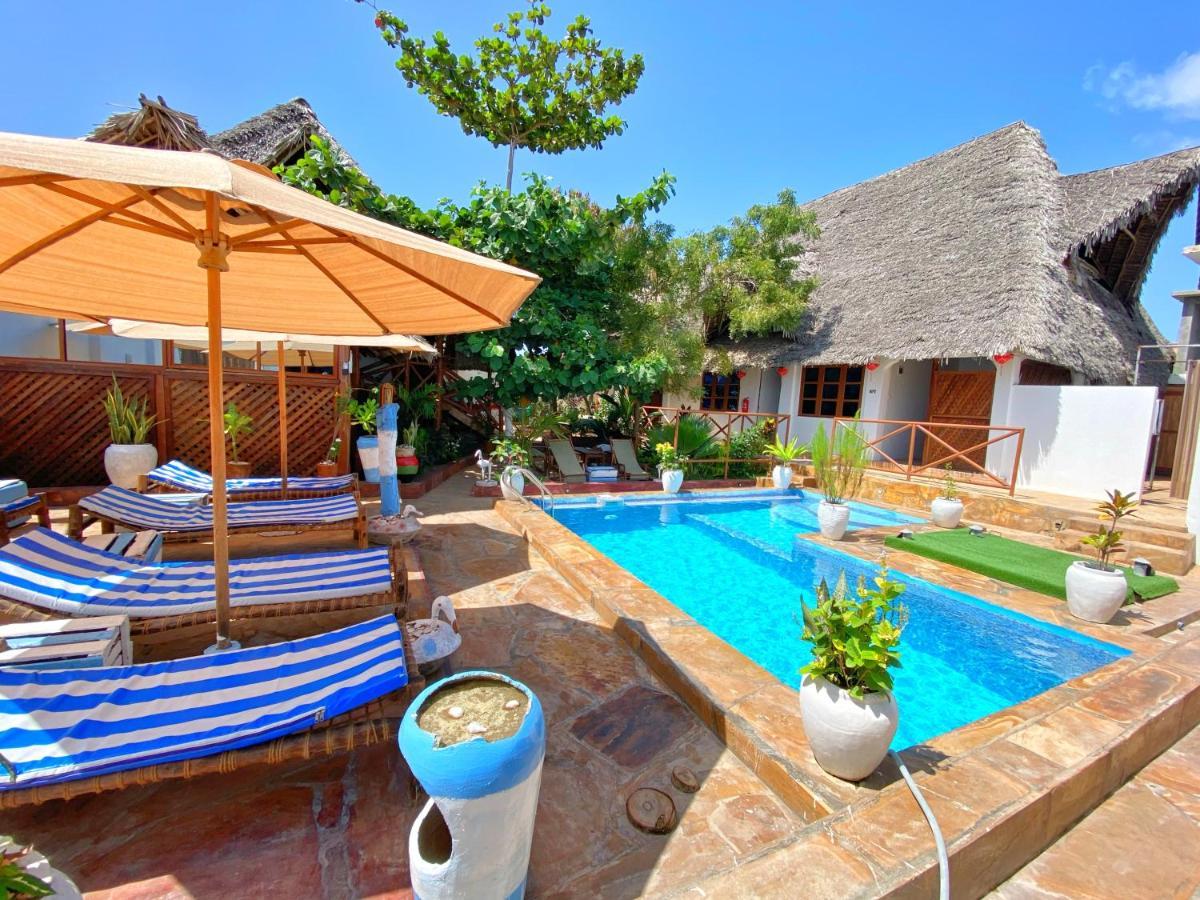Utulivu Bungalow นูงวี ภายนอก รูปภาพ