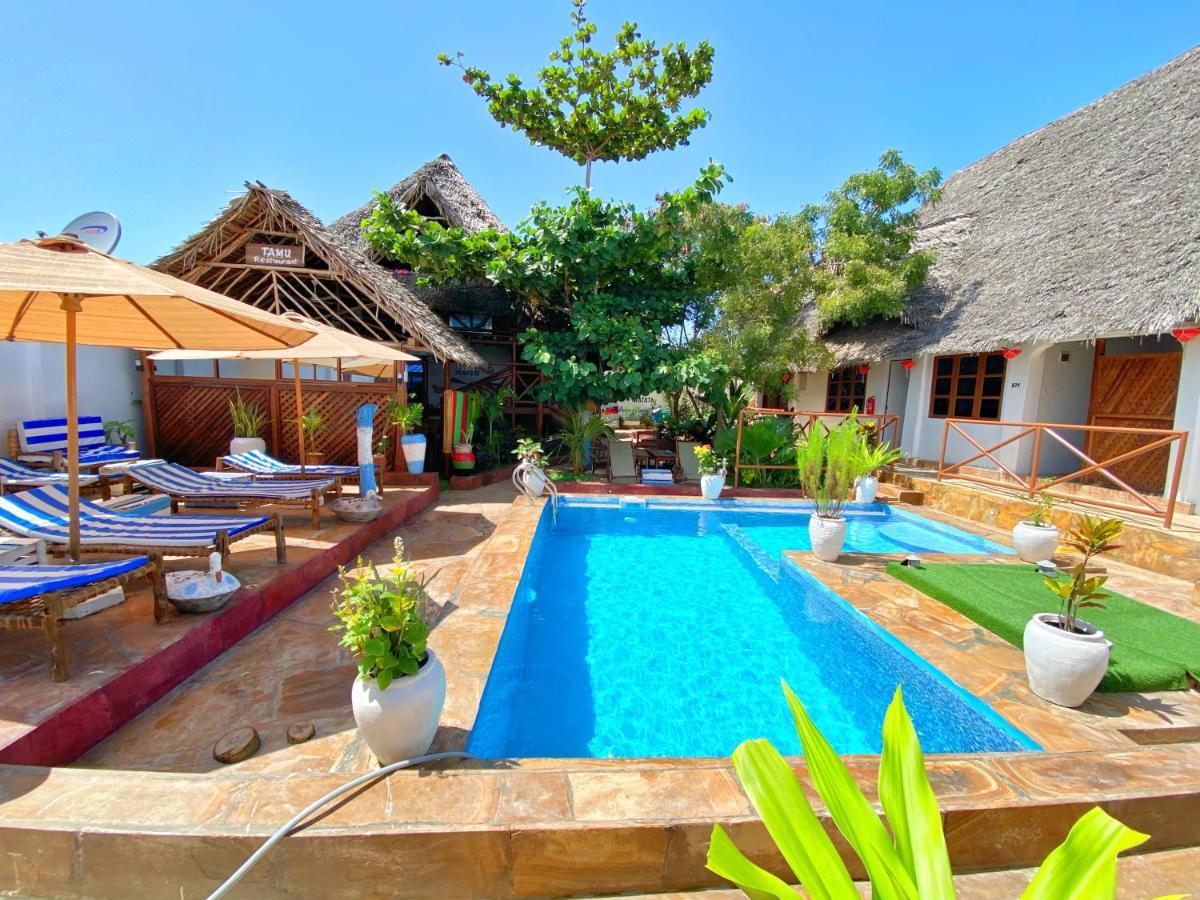 Utulivu Bungalow นูงวี ภายนอก รูปภาพ