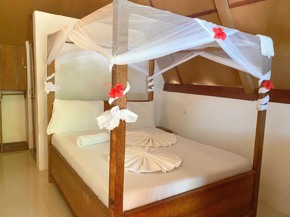 Utulivu Bungalow นูงวี ภายนอก รูปภาพ