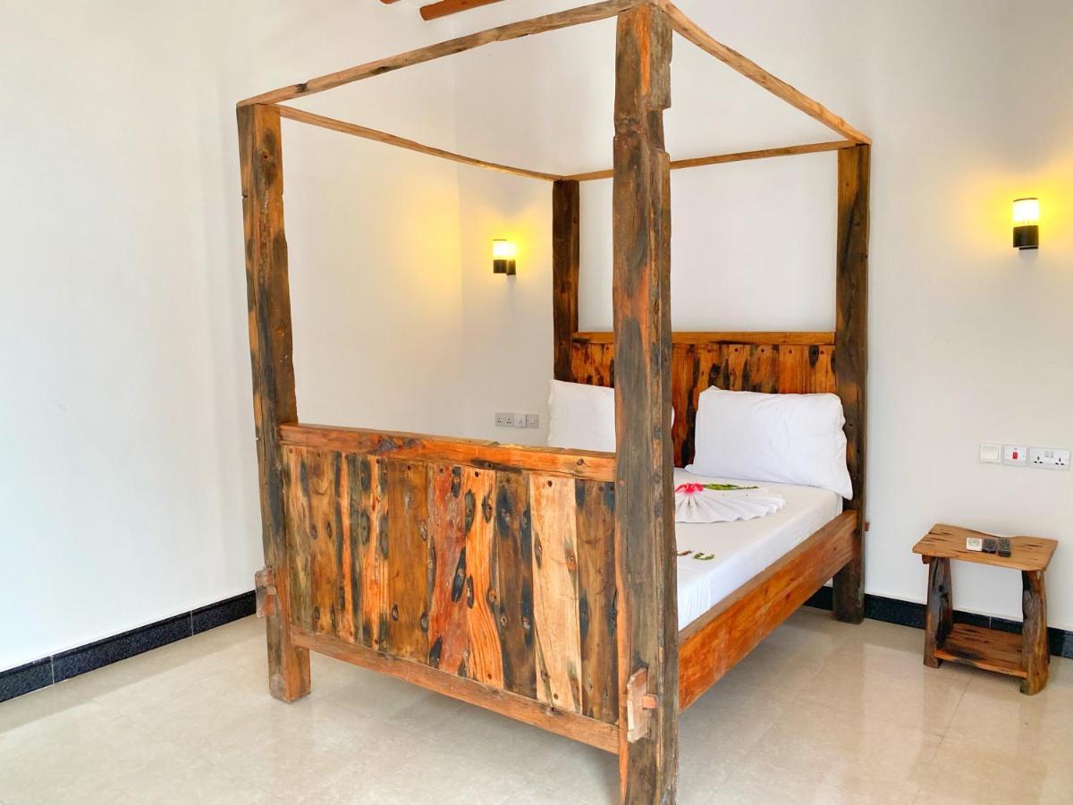 Utulivu Bungalow นูงวี ภายนอก รูปภาพ