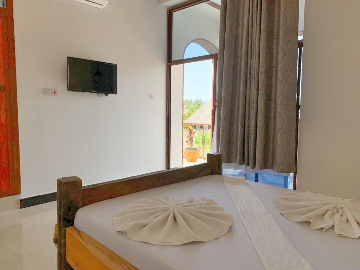 Utulivu Bungalow นูงวี ภายนอก รูปภาพ