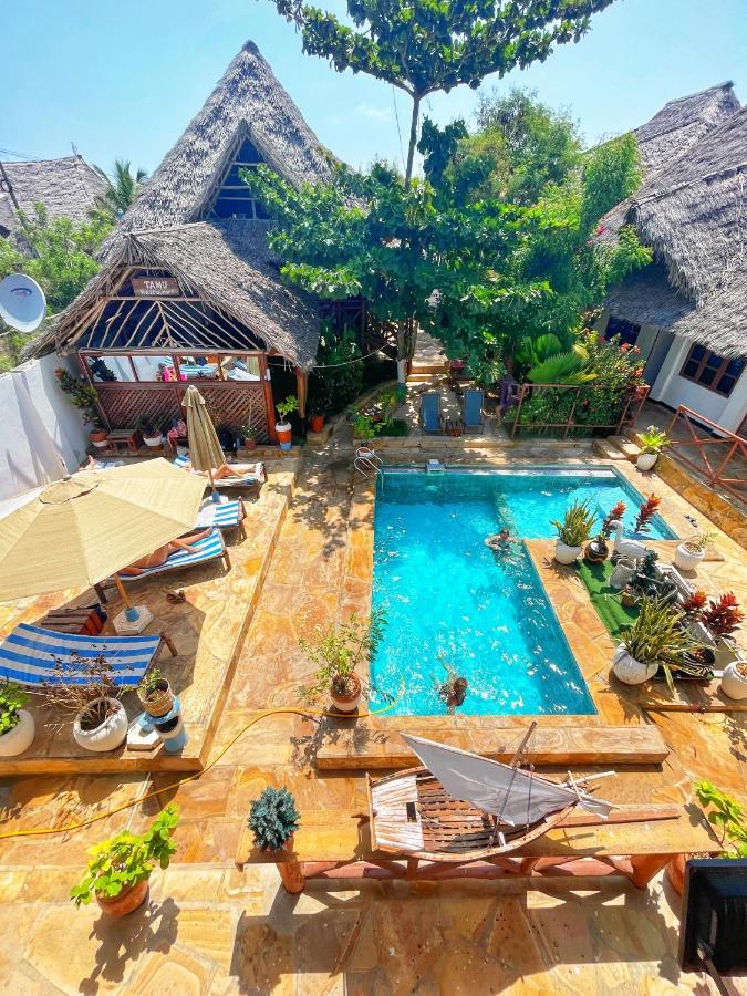 Utulivu Bungalow นูงวี ภายนอก รูปภาพ