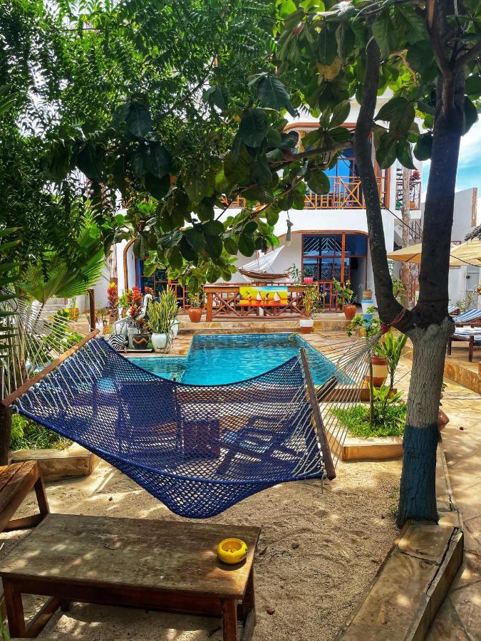 Utulivu Bungalow นูงวี ภายนอก รูปภาพ